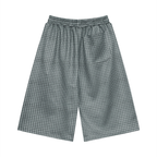Navy blue plaid drawstring shorts with elastic waistband and side patch pocket