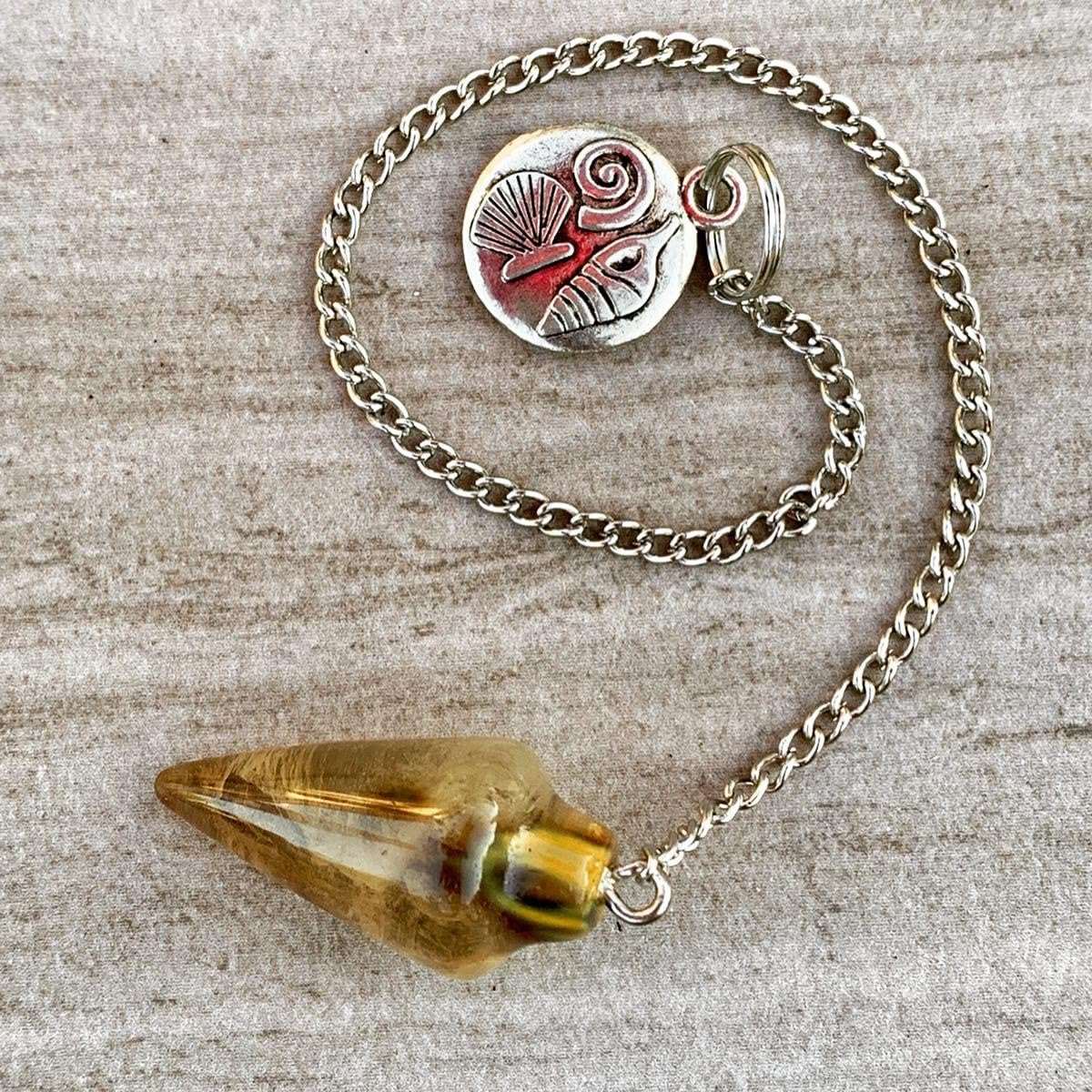 Tiger eye gemstone pendulum bag charm with silver chain and red-and-silver disc charm