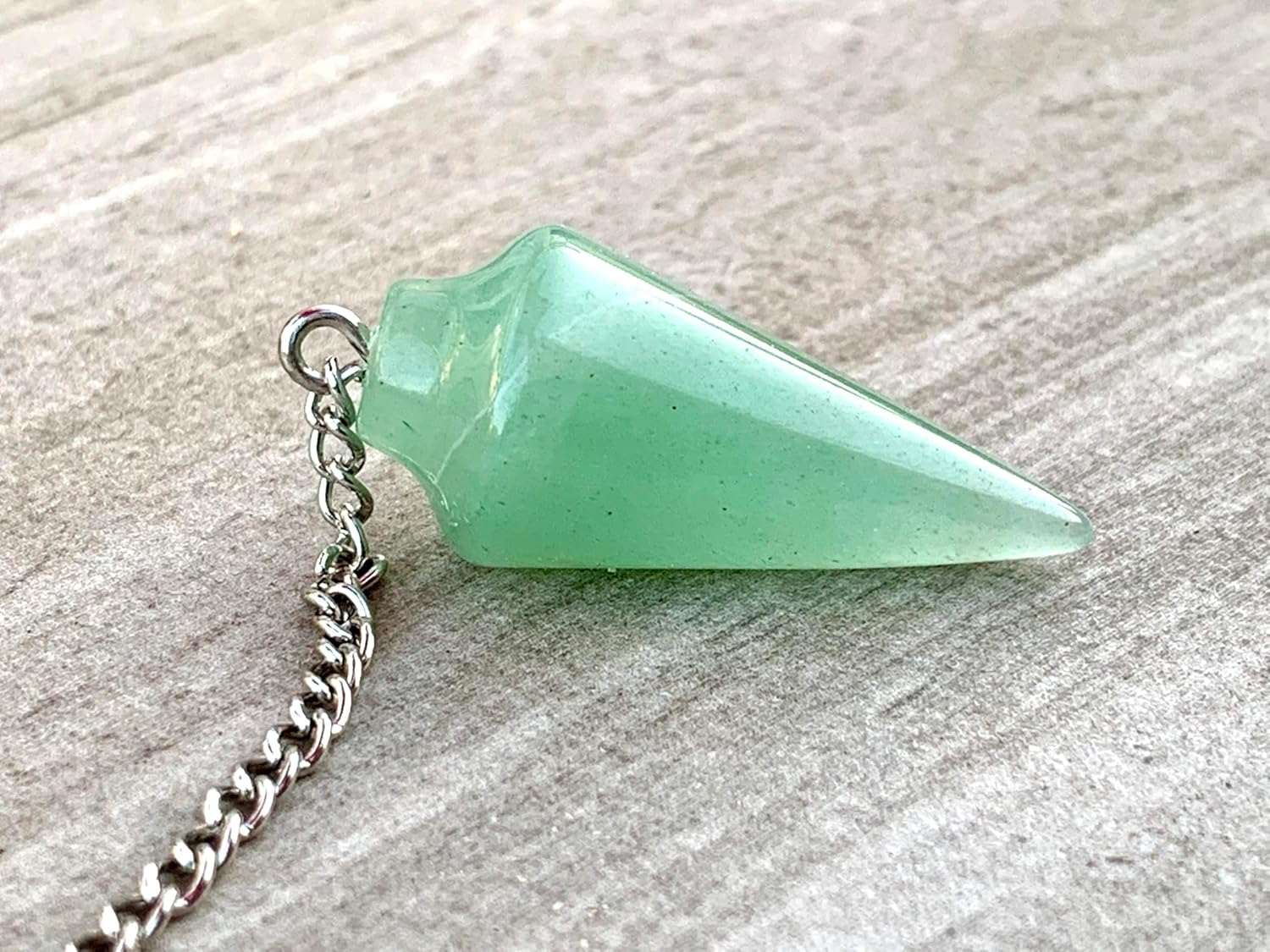 Green aventurine pendulum charm with silver chain and angled pointed stone