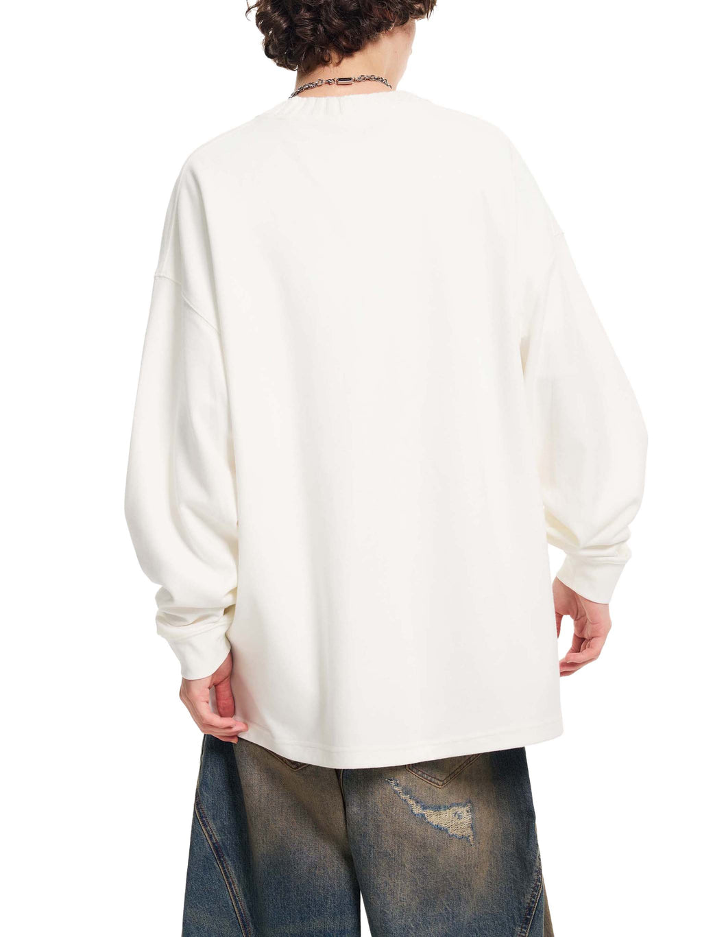 White oversized knit sweatshirt, back view with round neckline and long sleeves