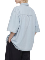 Light blue unisex drop-shoulder lyocell shirt, back side view, short sleeves
