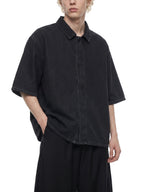 Black unisex vintage-wash lyocell drop-shoulder shirt, short sleeves, button collar