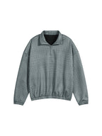 Plaid quarter-zip sweatshirt in dark green, front view, stand collar