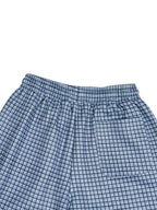 Sky blue plaid shorts with elastic waistband and drawstring