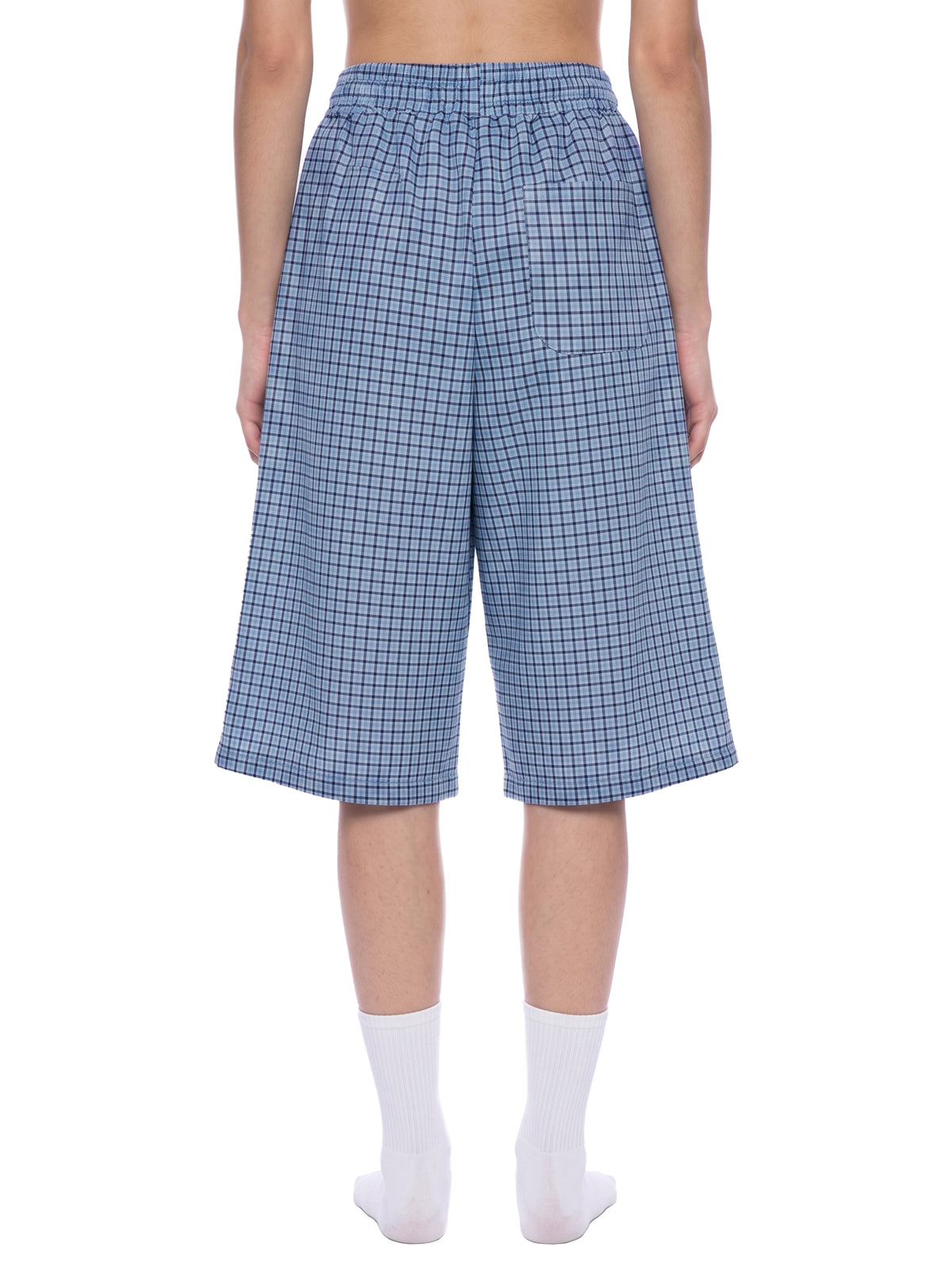 Blue plaid drawstring shorts with elastic waistband, full front view