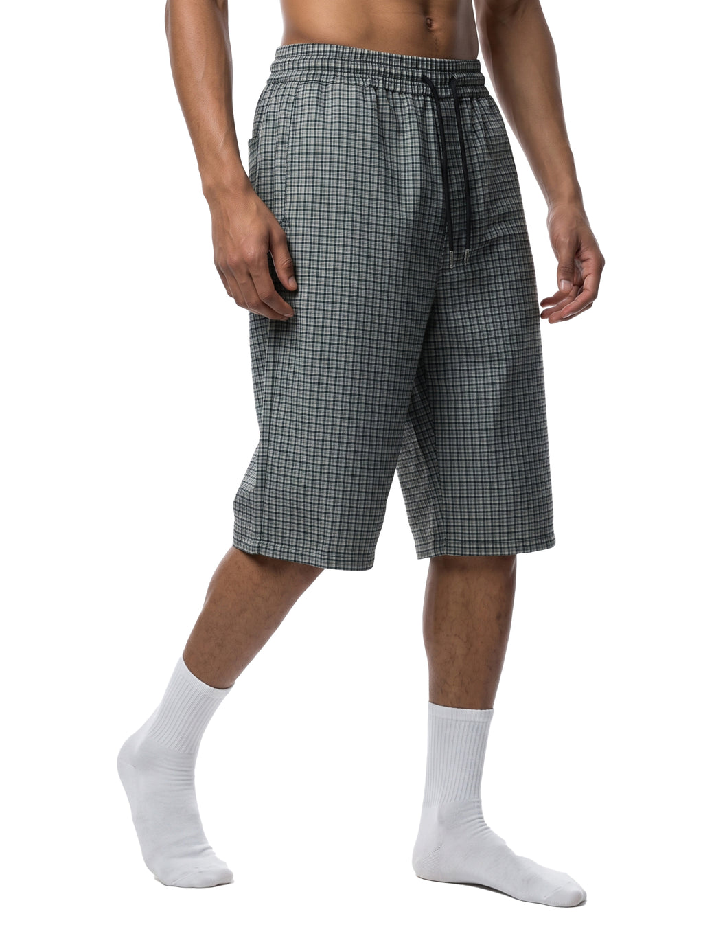Dark plaid drawstring shorts, side view with elastic waistband and drawcord