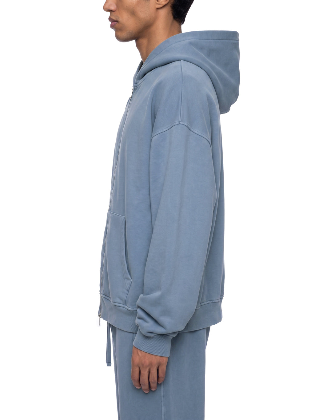 Jeans blue full-zip boxy hoodie with hood, kangaroo pocket, and ribbed cuffs (side view)