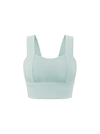 Light mint women’s yoga crop tank top with wide straps and smooth ribbed fabric