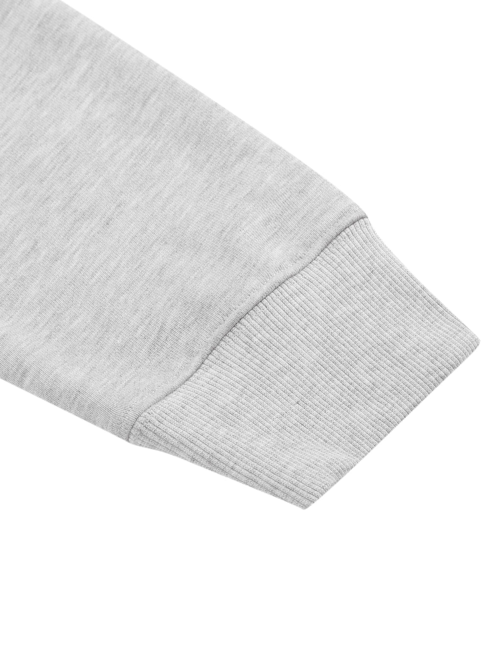 Light gray ribbed sleeve cuff on a quarter-zip crop sweatshirt