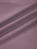 Women’s paneled yoga shorts, purple fabric close-up