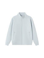 Light stand collar zip jacket in pale blue with side zippers and long sleeves.
