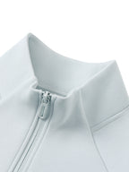 Light blue stand-collar jacket neckline with zip placket and zipper pull