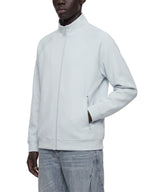 Pale blue stand collar zip jacket with front zipper and side pockets, close side view.