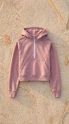 Pink cropped half-zip hoodie with drawstring hood and front pouch pocket