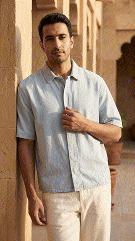 Light blue vintage-wash lyocell short-sleeve button-front shirt, front view on model