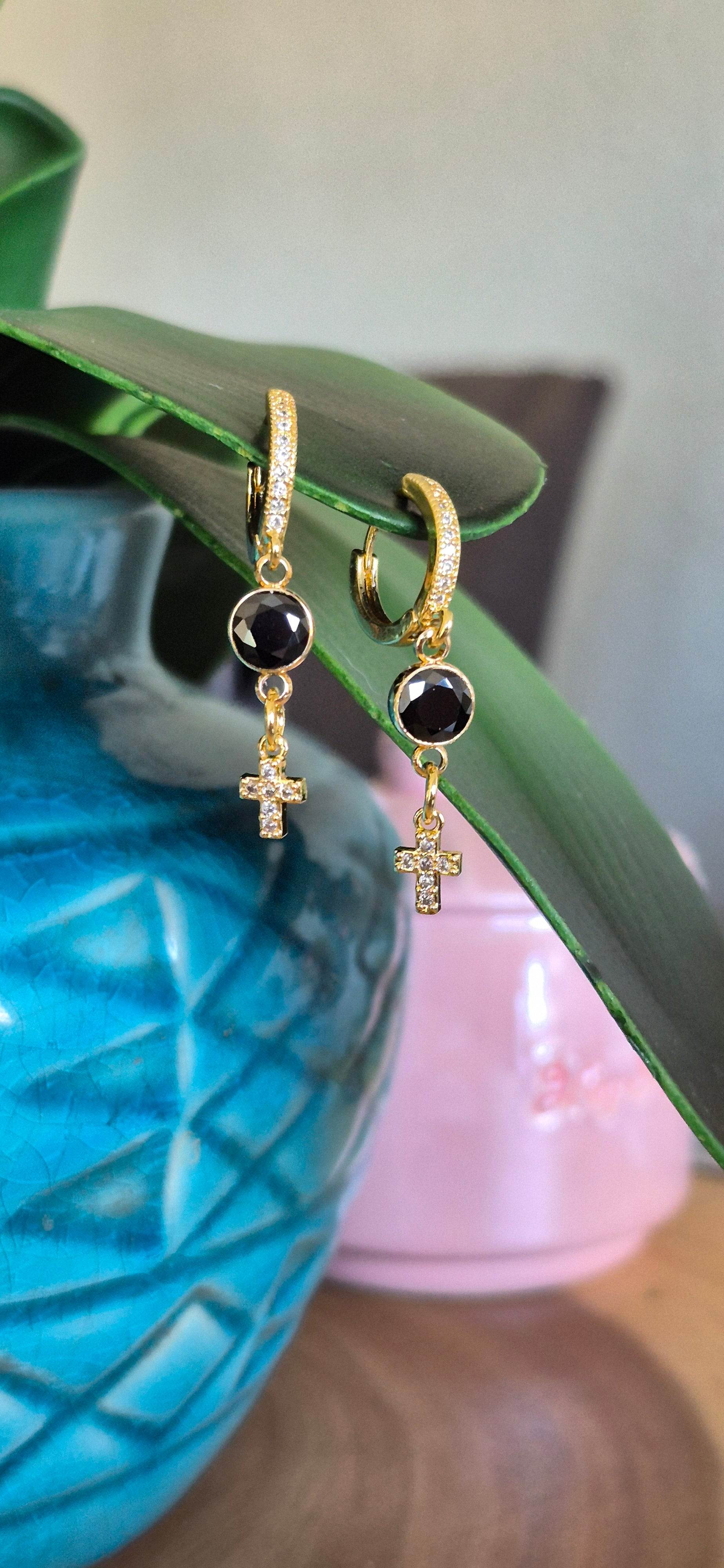 Gold cross hoop huggie earrings with black round zircon and chain link cross charms